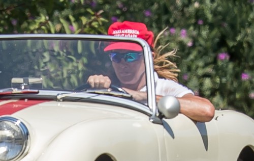 EXCLUSIVE: Caitlyn Jenner wears a red 'Make America Great Again' while cruising her classic car in Malibu